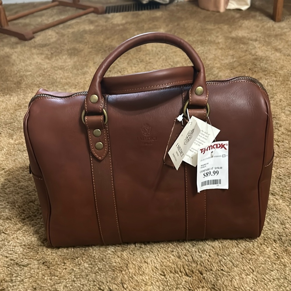 New I Medici leather purse,  new with tags,  brown have shoulder strap.